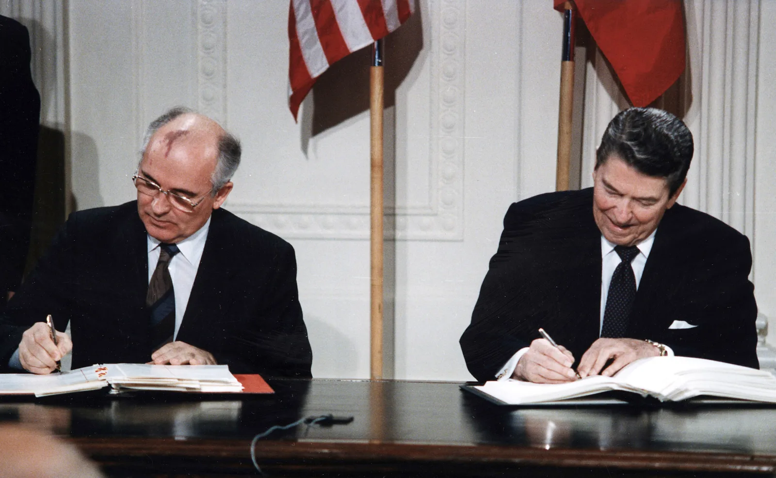 President Reagan and Soviet General Secretary Gorbachev signing the INF Treaty in the East Room, December 8, 1987
